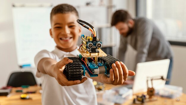 Father and son making robot