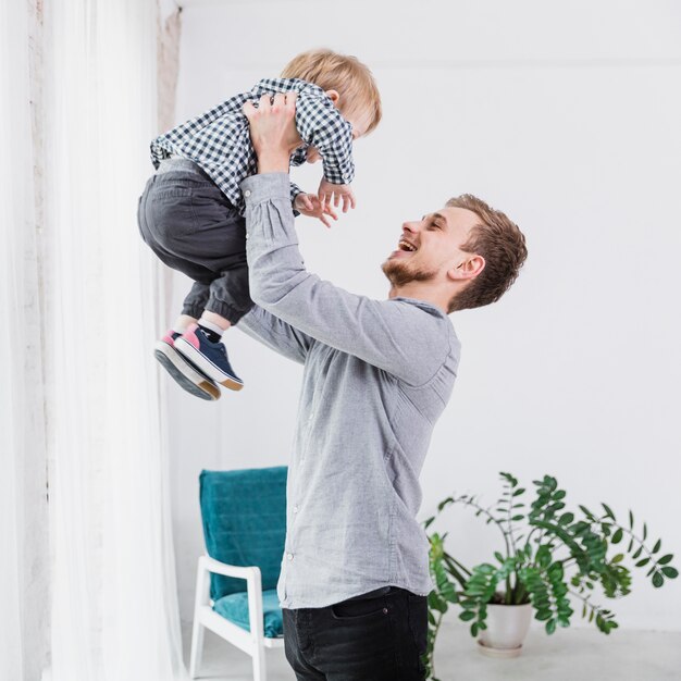 Father and son playing together on fathers day