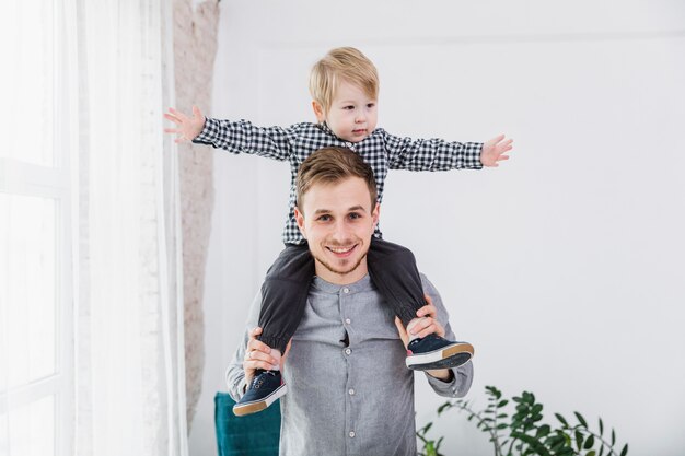 Father and son playing together on fathers day