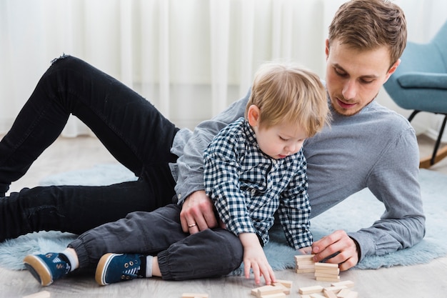 Father and son playing together on fathers day