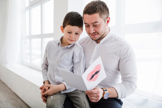 Father and son playing together on fathers day