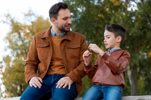 Free photo father and son spending time together