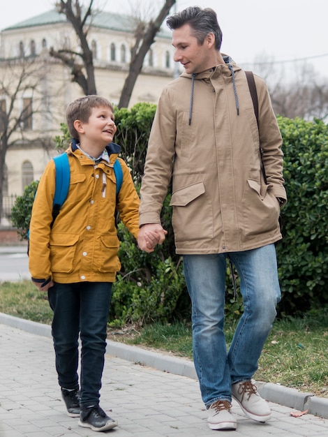 Father and son taking a walk outdoors