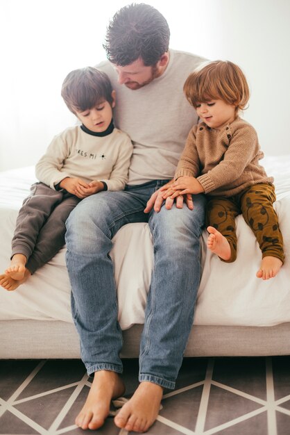 Father with boys at home