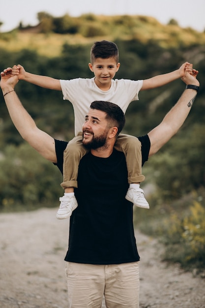 Father with son in forest