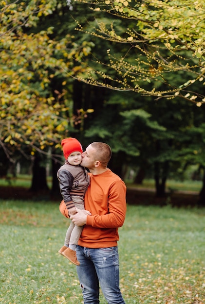 Father with son playing at the garden