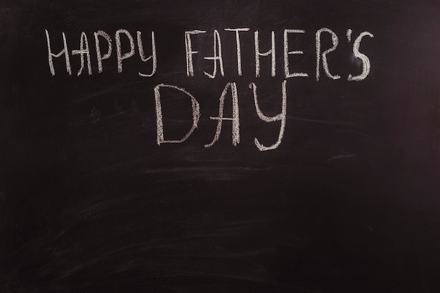 Fathers day composition on blackboard with copyspace