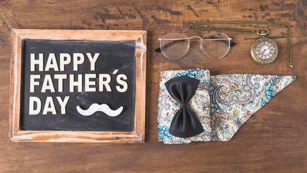 Fathers day composition with accessories and slate