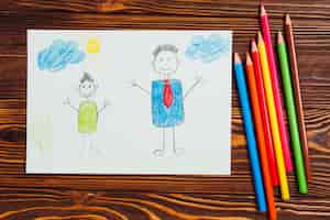 Free photo fathers day composition with kids drawing