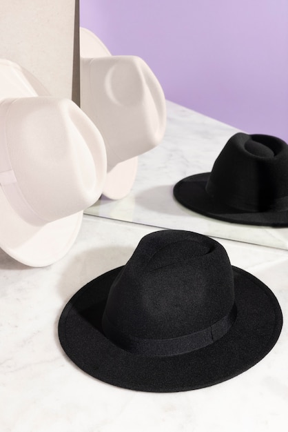 Free photo fedora hats in studio still life