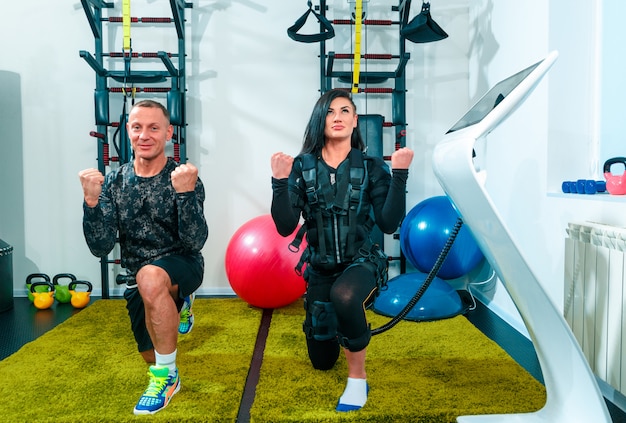 The female athlete doing they exercise in a ems fitness studio