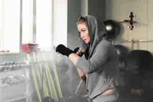 Free photo female boxer training for a new competition with copy space