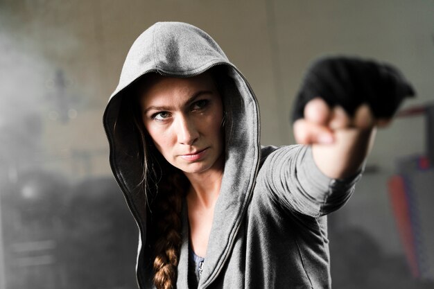 Female boxer training for a new competition