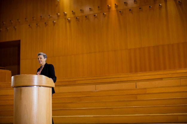 Female business executive giving a speech