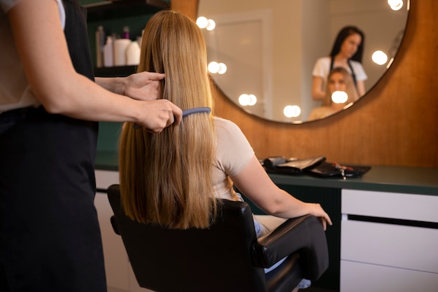 Female client getting her hair done at the hairdresser