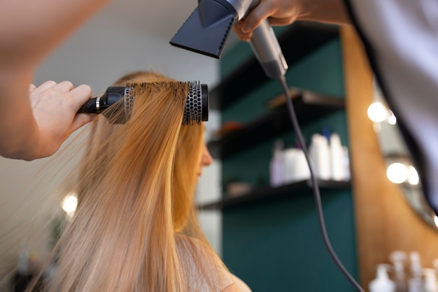 Female client getting her hair done at the hairdresser