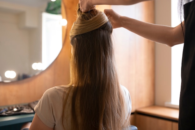 Female client getting her hair done at the hairdresser