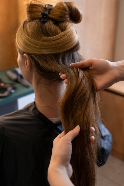 Female client getting her hair done at the hairdresser