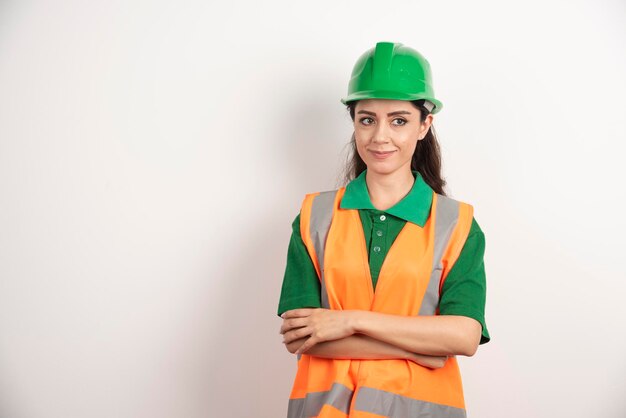 Female construction site engineer with helmet . High quality photo