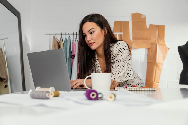 Female designer working in her workshop