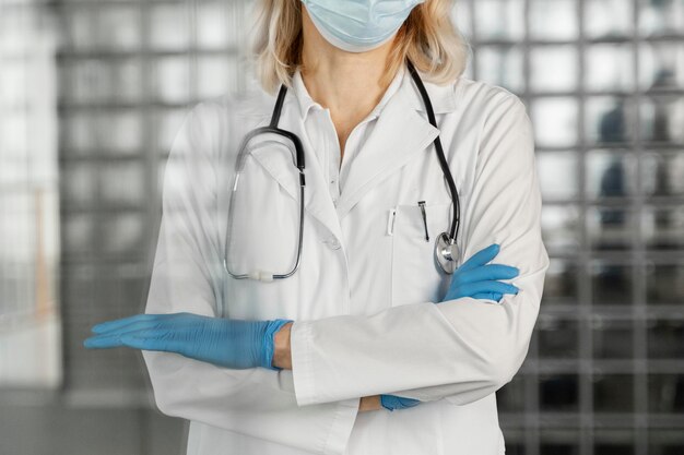 Female doctor portrait with medical mask