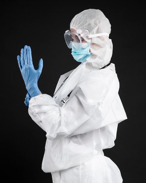 Female doctor wearing pandemic medical equipment