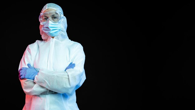 Female doctor wearing protective medical equipment