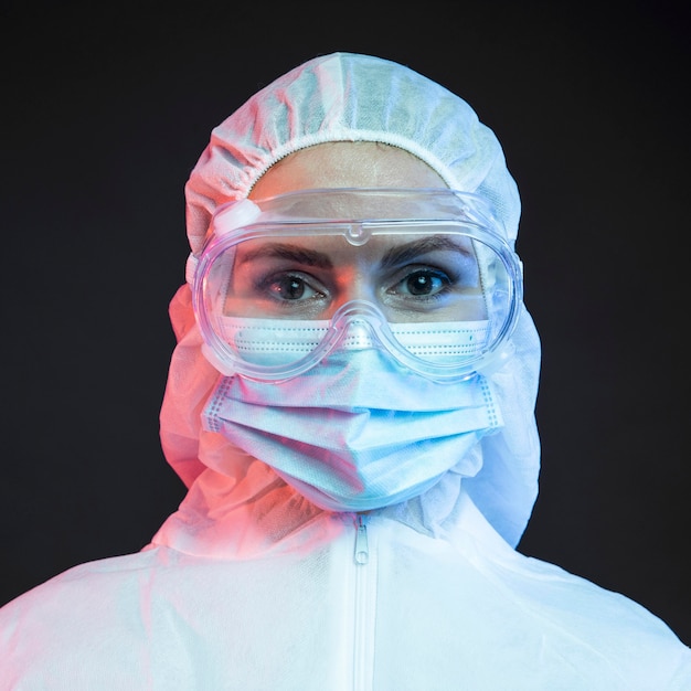 Free photo female doctor wearing protective medical wear