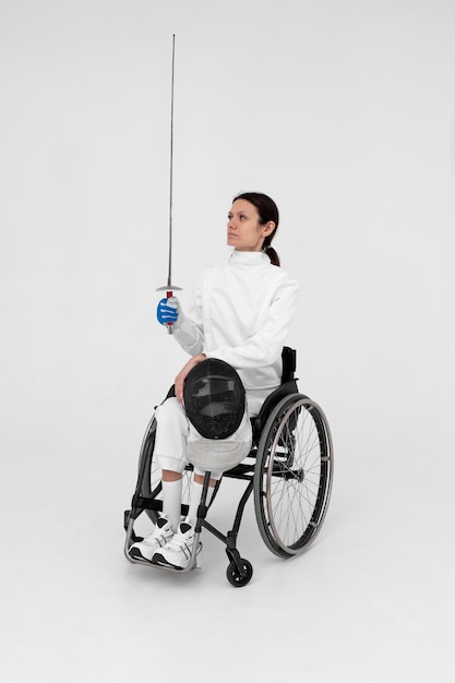 Free Photo female fencing player having a legs disability