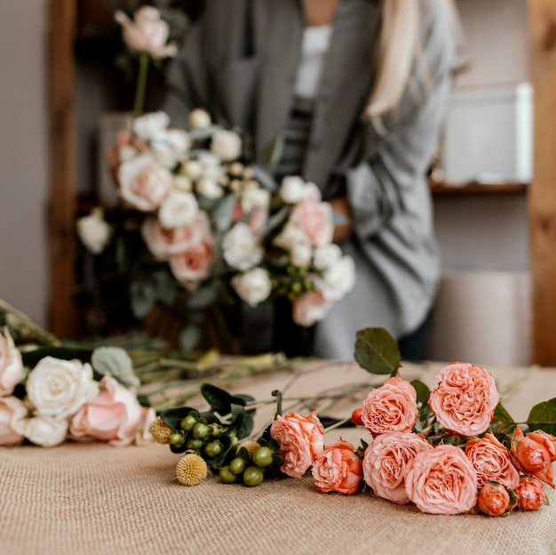 Female florist making a beautiful floral arrangement