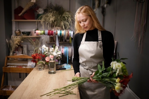 Female florist making a bouquet