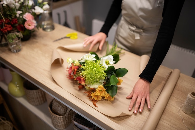 Female florist making a bouquet