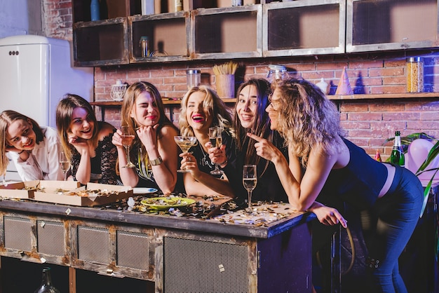 Female friends on kitchen