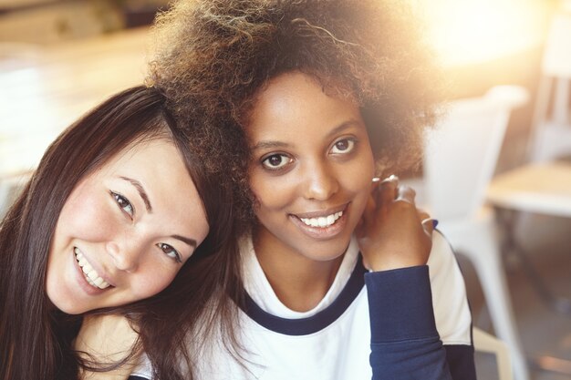 Female friends sitting in cafe