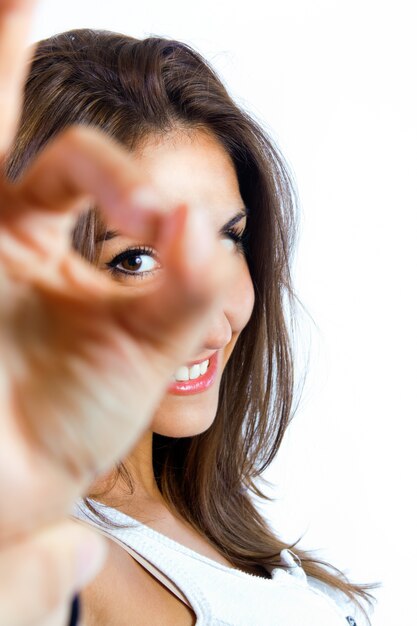 Female giving ok sign to camera