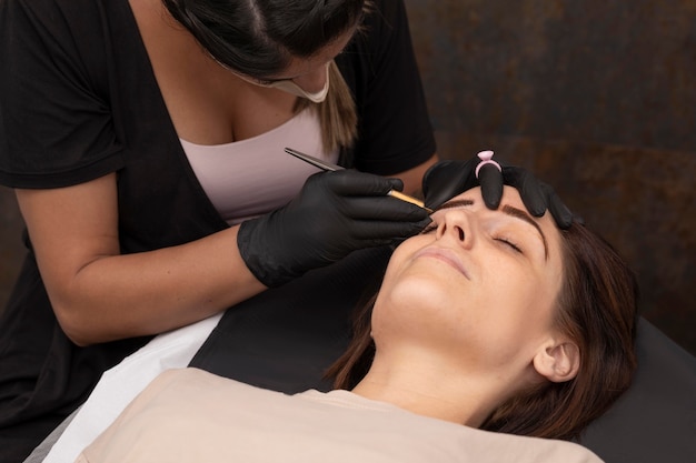 Female going through a microblading treatment