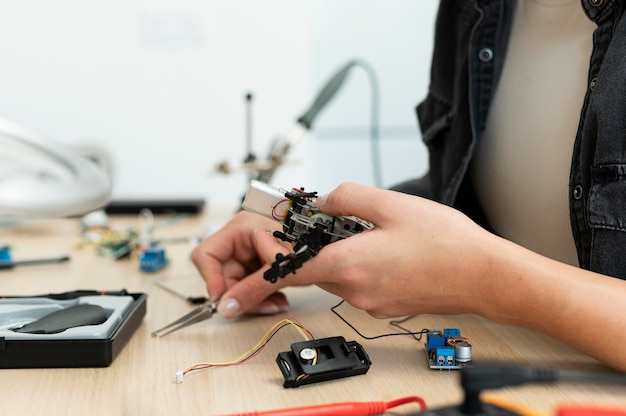 Female inventor working at a new creation