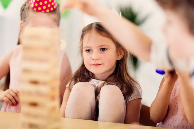 Female kid with blue eyes on party