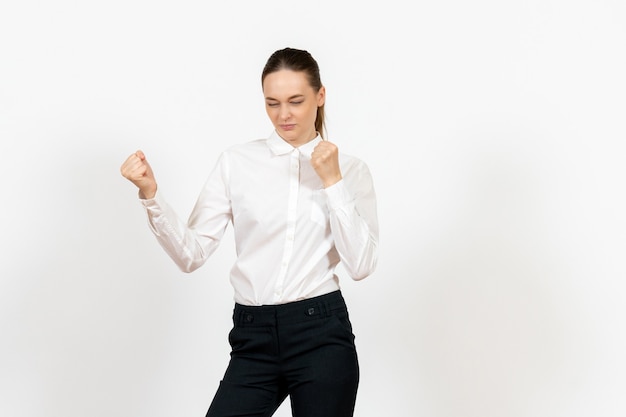 female office employee in elegant white blouse on white