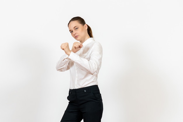 Free Photo female office employee in elegant white blouse on white