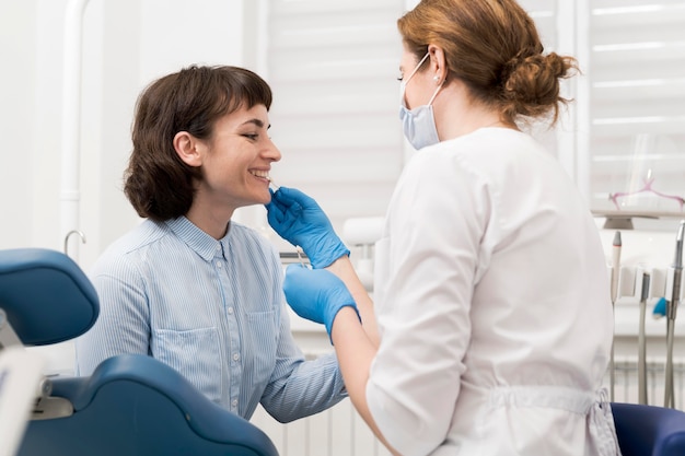 Female patient having a procedure done at the dentist