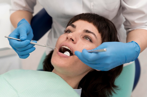 Female patient having a procedure done at the dentist