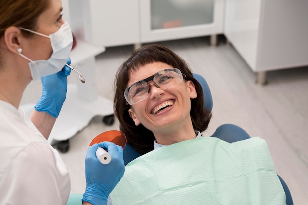 Female patient having a procedure done at the dentist