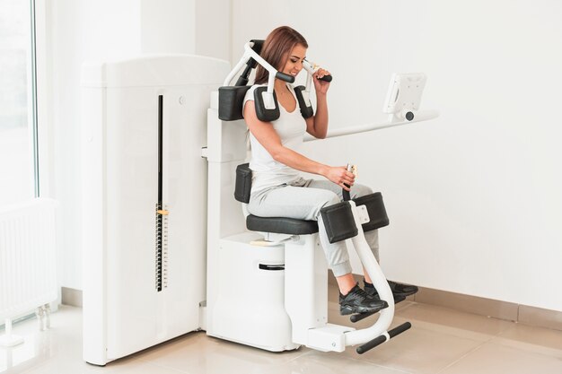 Female patient working out medical exercises