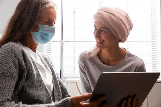 Free photo female patients talking at the hospital indoors