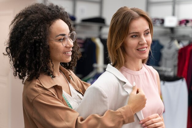 Female personal shopper helping cutomer