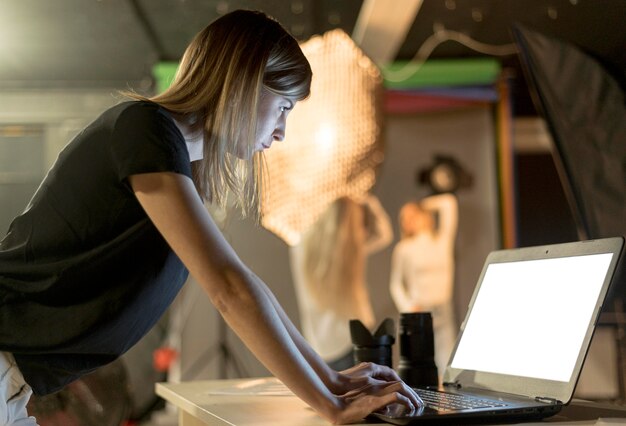 Female photographer editing the photos