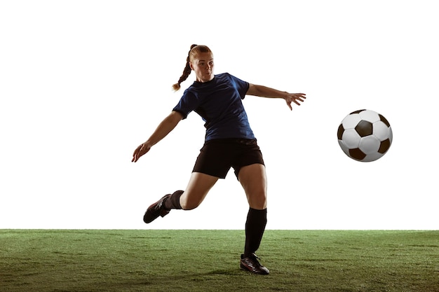 Female soccer, football player kicking ball, training in action and motion