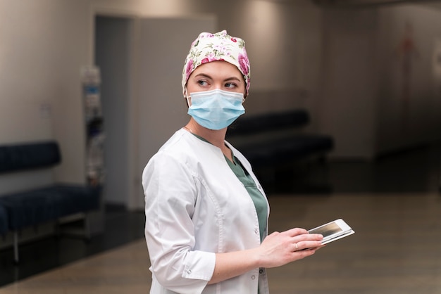 Female student at medicine wearing medical mask