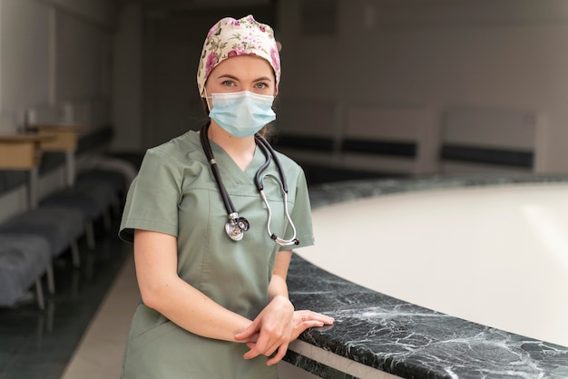 Female student at medicine wearing medical mask